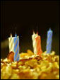 В воздушном торте стоит несколько потухших свечей. Желание загадано. С Днем Рождения.