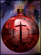 Декоративный новогодний шар отражает в своем глянце голгофский крест, провозглашая, что Рождество без Иисуса подобно Дню Рождения ради торта.