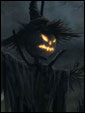 Посреди мрачного ночного поля стоит отвратительное пугало со светящейся тыквой - вот оно, - настоящее лицо Хэллоуина.