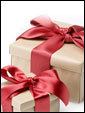 Три упакованных новогодних подарка: пусть Новый Год волшебной сказкой в ваш дом тихонечко войдет, и счастье, радость, доброту и ласку вам в дар с собою принесет!